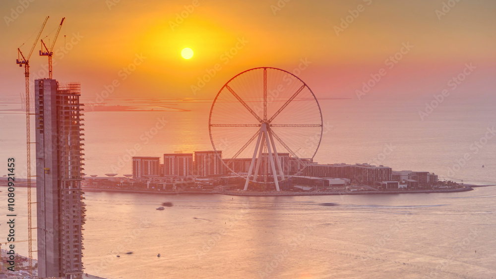 Bluewaters island at sunset aerial timelapse with ferris wheel Bluewaters island at sunset aerial timelapse with ferris wheel