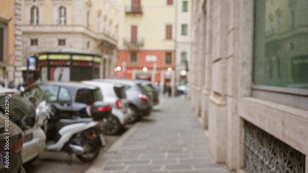 Naklejka premium Blurred view of an old street in rome at night with defocused lights and parked cars capturing the essence of urban italy.