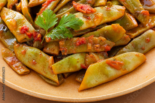 Close up view of taze fasulye - Turkish style stewed runner beans. Popular meze and summer food. photo