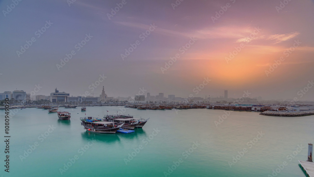 Sunset at Doha Bay timelapse with Traditional Wooden Dhow Fishing Boats. Sunset at Doha Bay timelapse with Traditional Wooden Dhow Fishing Boats.