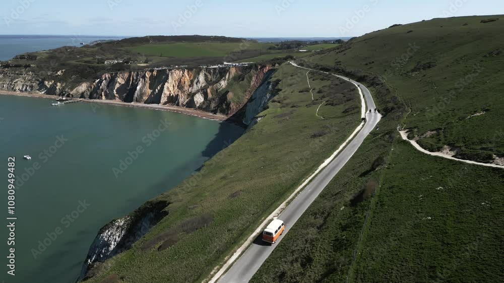 Aerial view of the coastal island and a road on the island Aerial view of the coastal island and a road on the island