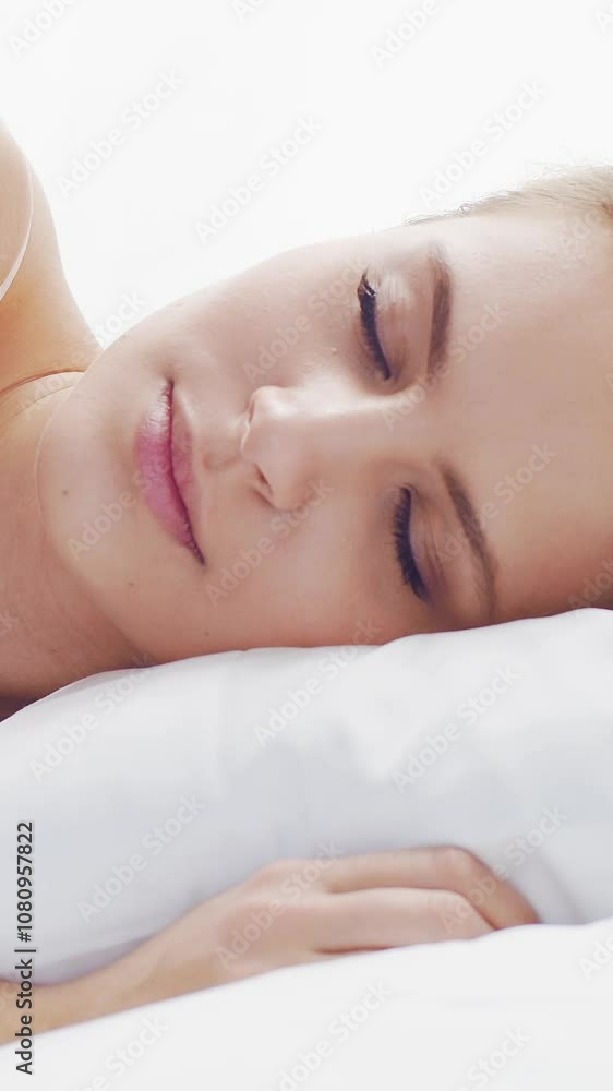 Peaceful, serene scene of a young woman sleeping comfortably in bed, with soft, natural lighting. Perfect for themes of relaxation, rest, and tranquility. Peaceful, serene scene of a young woman sleeping comfortably in bed, with soft, natural lighting. Perfect for themes of relaxation, rest, and tranquility.