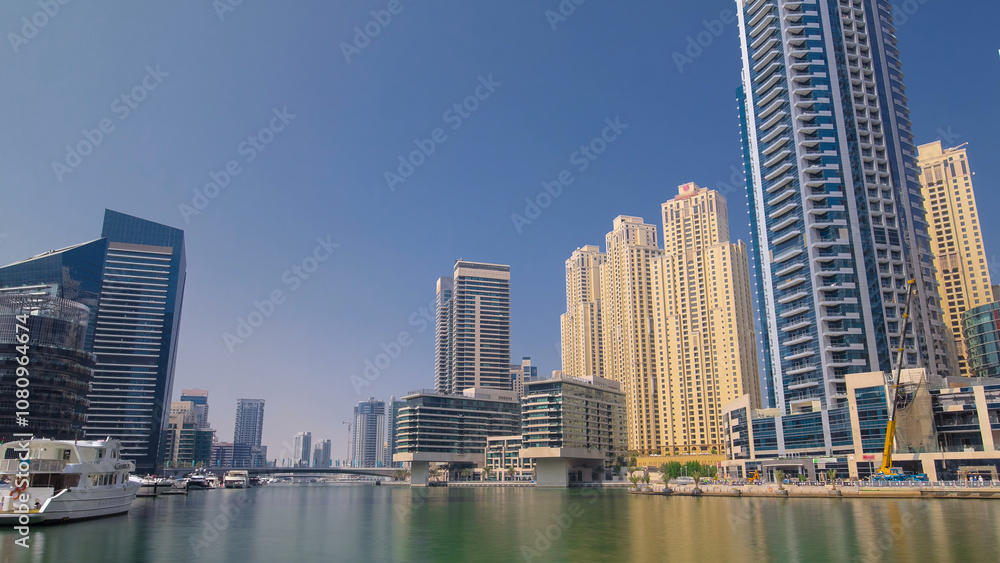 Obraz premium Dubai Marina skyscrapers. View from embankment timelapse hyperlapse