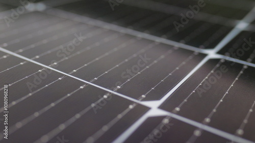 Close-up of modern photovoltaic solar battery panels. Solar panel, photovoltaic, alternative electricity source. Efficient ecological solar farm. Photovoltaic solar panel extreme close up