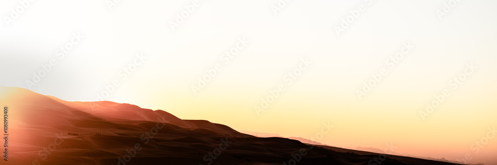 Fototapeta premium Sand dunes desert landscape at sunset, with camel tour. Erg Chebbi. Merzouga. Sahara. Morocco. Africa.