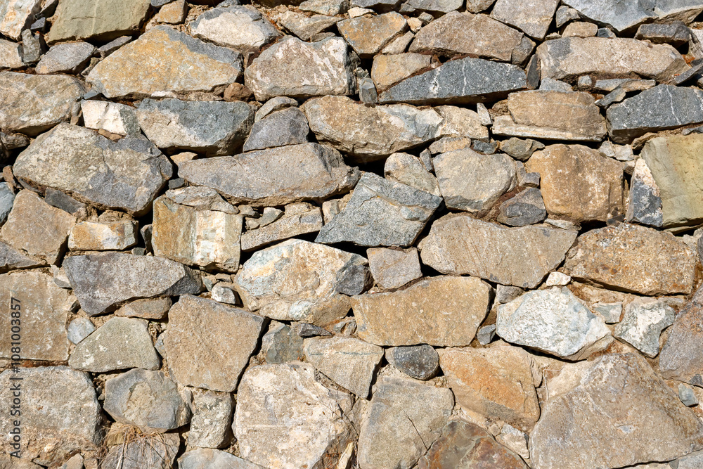 Old rough natural stone wall texture Old rough natural stone wall texture