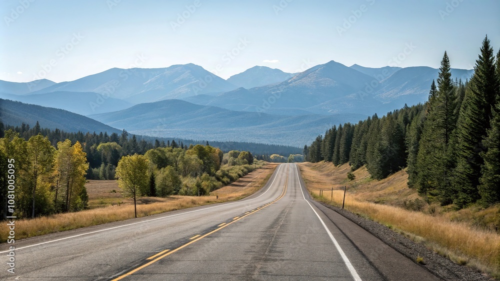 Fototapeta premium Wide open road stretches out before a mountain landscape with trees and mountains in the distance, roadscape, rural