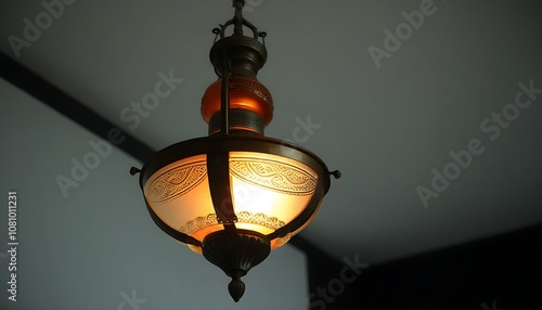 Details of a classic hanging lamp with elegant design, presenting a cozy atmosphere. photo