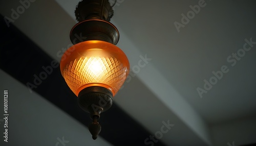 Details of a classic hanging lamp with elegant design, presenting a cozy atmosphere. photo