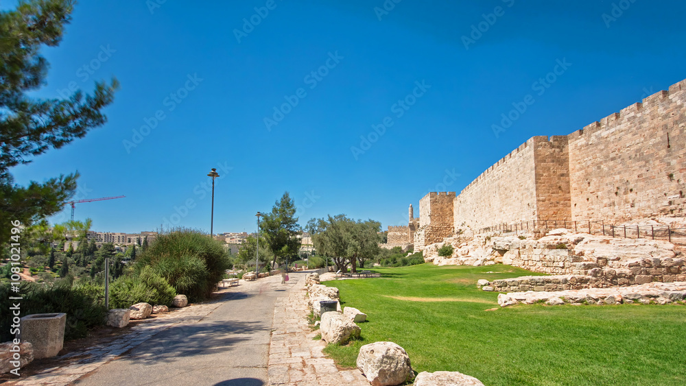 Defensive wall of the ancient holy Jerusalem timelapse hyperlapse, lit by the bright sun. Defensive wall of the ancient holy Jerusalem timelapse hyperlapse, lit by the bright sun.