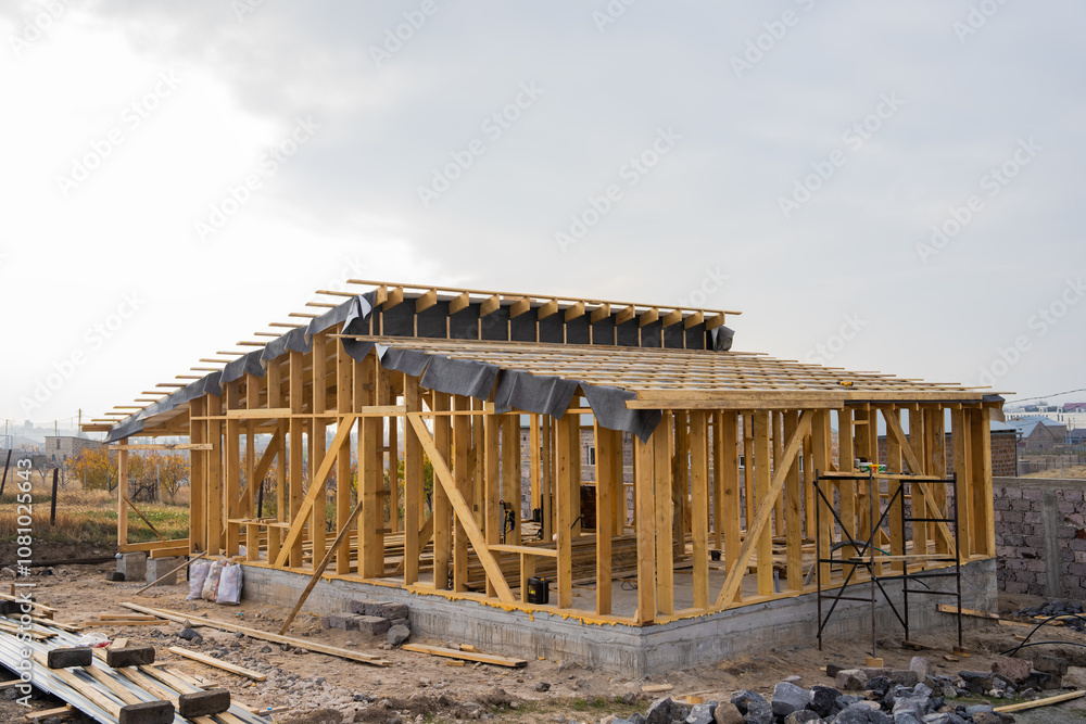 Construction works, building a house with wood Construction works, building a house with wood
