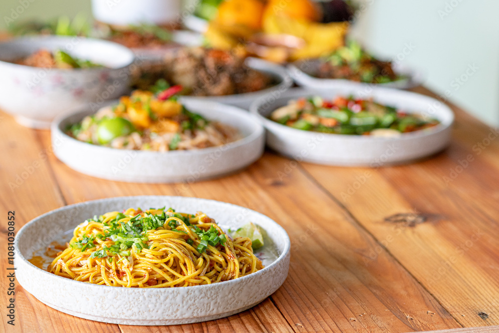 The Khao Soi Yuan Naan that is served on the plate is Khao Soi noodles mixed with minced pork spring onion coriander and chili lime and sesame spicy and sour. noodles chinese food tai yai food The Khao Soi Yuan Naan that is served on the plate is Khao Soi noodles mixed with minced pork spring onion coriander and chili lime and sesame spicy and sour. noodles chinese food tai yai food