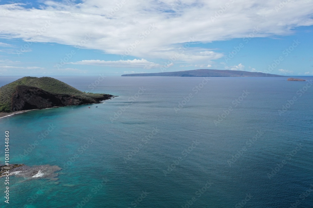 Makena, molokini, kooholawe on a calm day in south maui. Makena, molokini, kooholawe on a calm day in south maui.