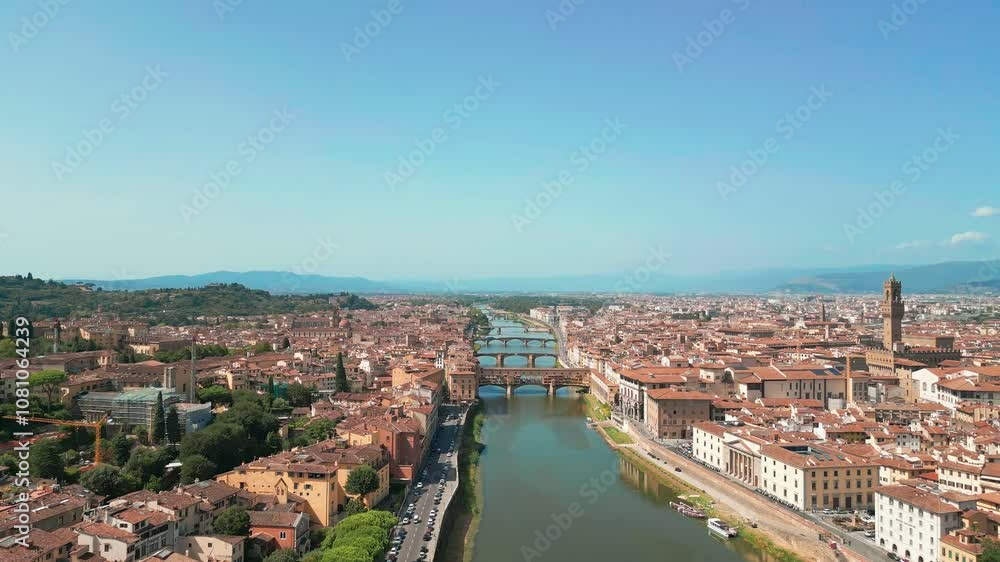 Aerial shot over the Arno River in Florence, Italy Aerial shot over the Arno River in Florence, Italy