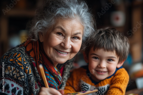 Smiling grandmother and grandson bonding indoors, highlighting family love and connection.