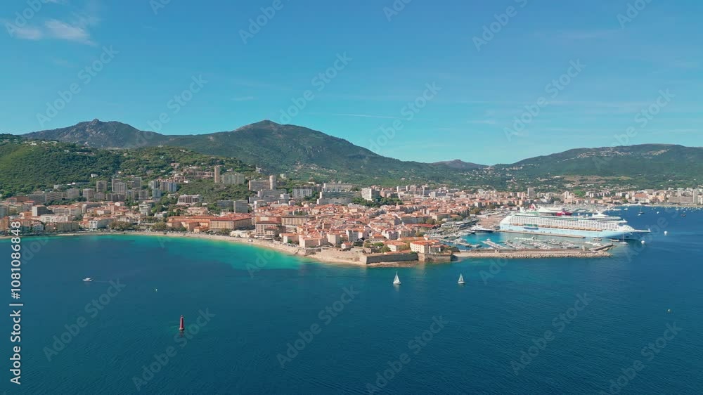 Aerial view over ocean, coastline and cruiseship in Corsica, France Aerial view over ocean, coastline and cruiseship in Corsica, France