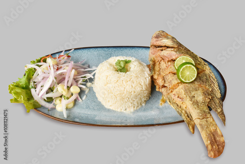 fried fish, with rice, yucca and salad, delicious food