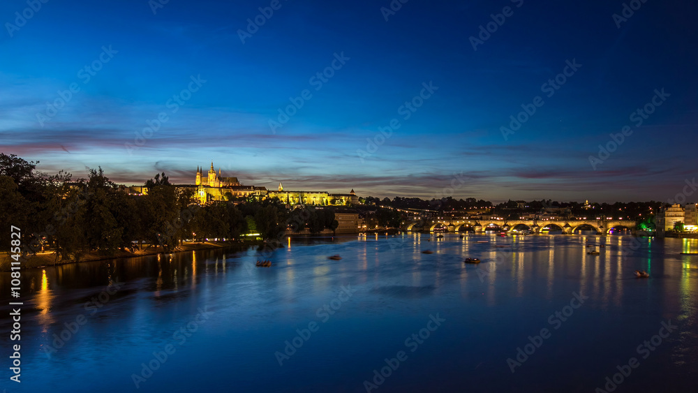View of the city Prague in Czech Republic day to night timelapse on the Vltava river with beautiful sky View of the city Prague in Czech Republic day to night timelapse on the Vltava river with beautiful sky
