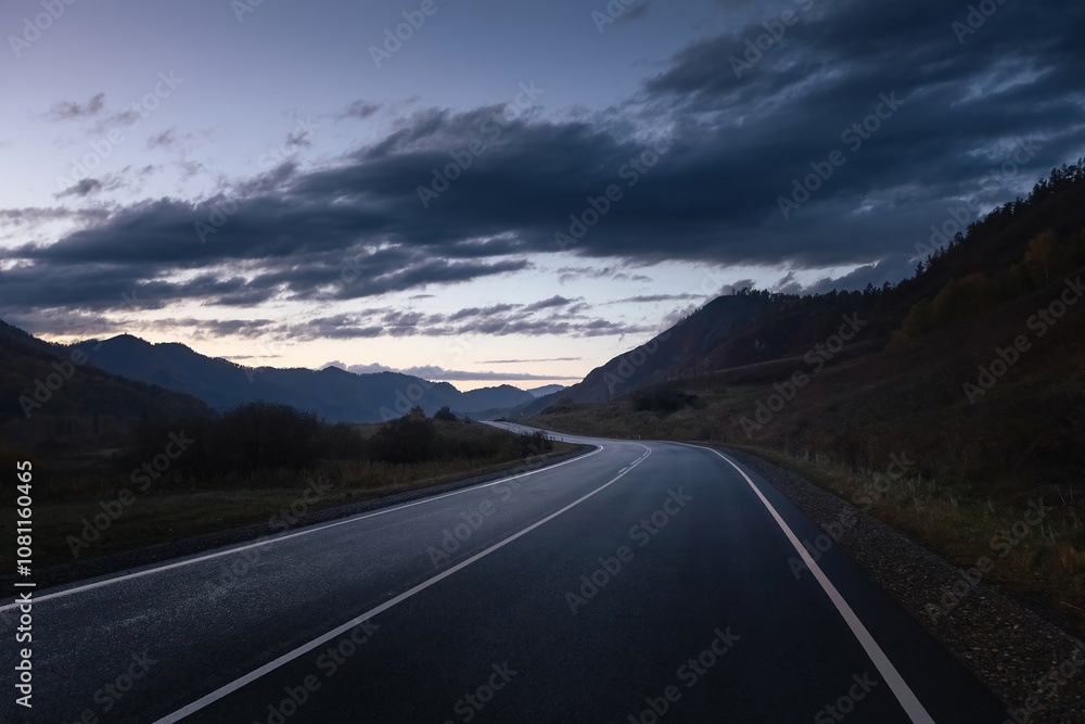 Naklejka premium highland road in the twilight.