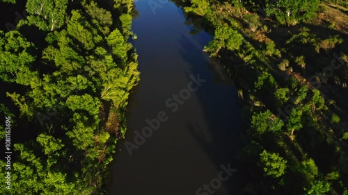 straight down aerial flyover of the green-lined Verde River near Camp Verde, Arizona