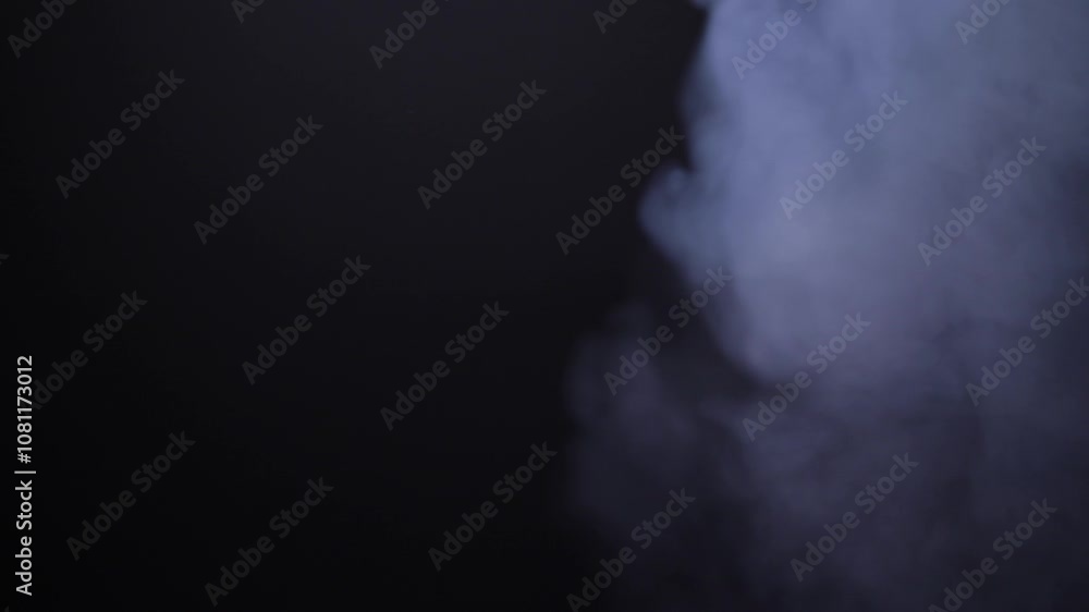 A swirling mass of smoke rushes into the frame from the right, swiftly filling the entire scene. Slow-motion Full HD video, perfect for adding dramatic atmosphere or creating a smoky overlay effect