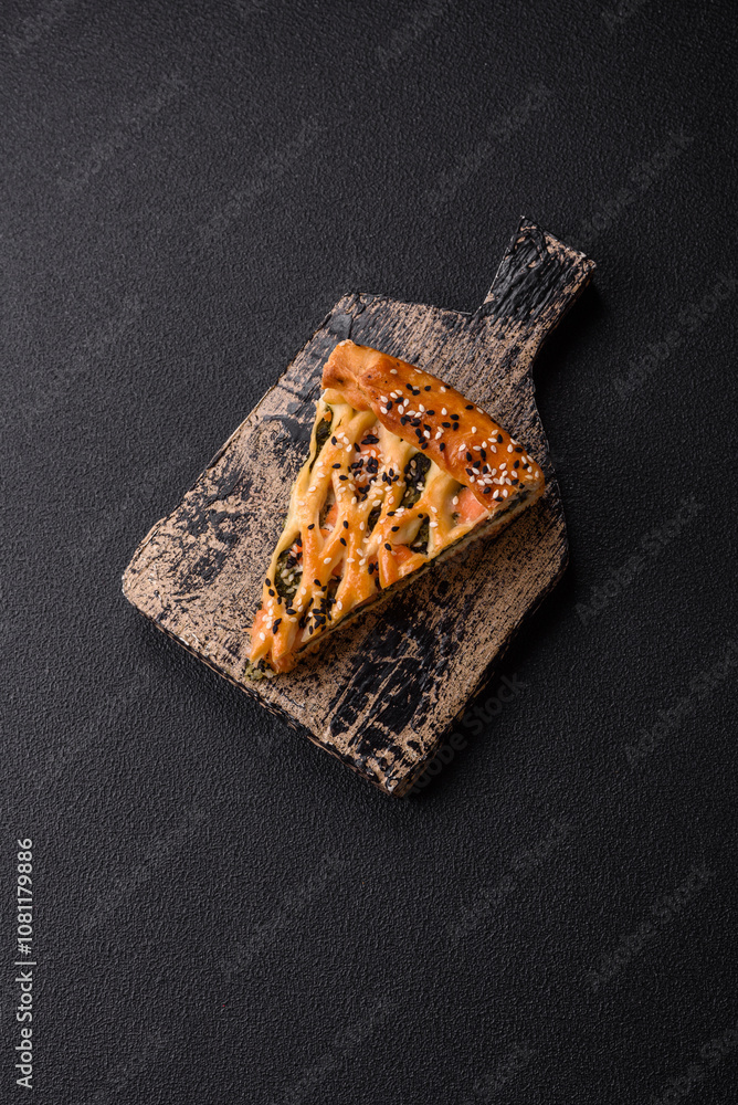 Pieces of quiche with salmon, spinach or broccoli, salt and spices Pieces of quiche with salmon, spinach or broccoli, salt and spices