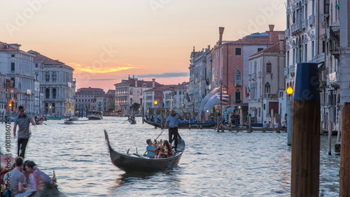 Fototapeta Naklejka Na Ścianę i Meble -  View of the Grand canal near Rialto Market day to night timelapse after sunset, Venice, Italy viewed from pier