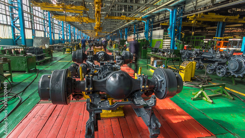 Conveyor assembly stage the body of tractor at big industrial factory timelapse photo