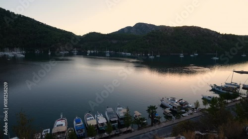 Sunset panorama at Kizkumu beach. Natural formation in Orhaniye bay. Bozburun peninsula. Marmaris district Mugla province, Turkey - 4k video  photo