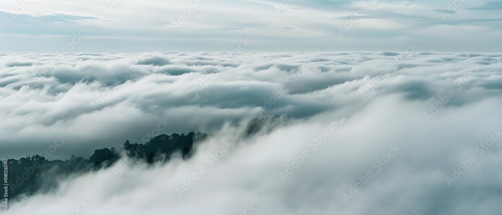 An endless sea of clouds blankets the landscape, with mist-shrouded peaks peeking through, creating a mystical and ethereal atmosphere. An endless sea of clouds blankets the landscape, with mist-shrouded peaks peeking through, creating a mystical and ethereal atmosphere.