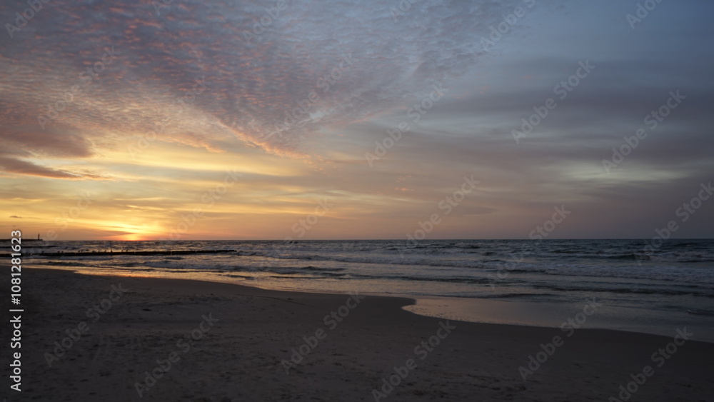 Sunset on the beach by the sea Sunset on the beach by the sea