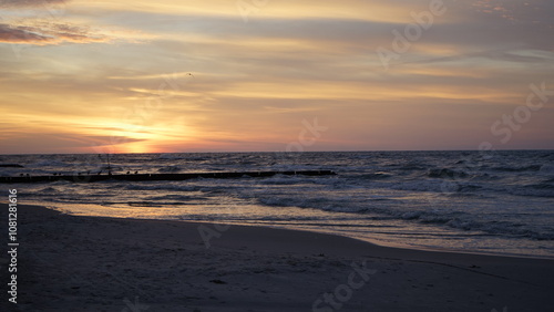 Sunset on the beach by the sea