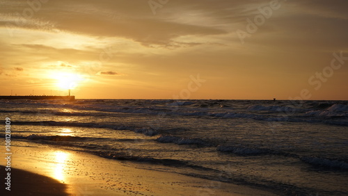 Sunset on the beach by the sea