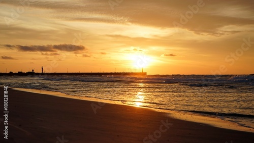 Sunset on the beach by the sea