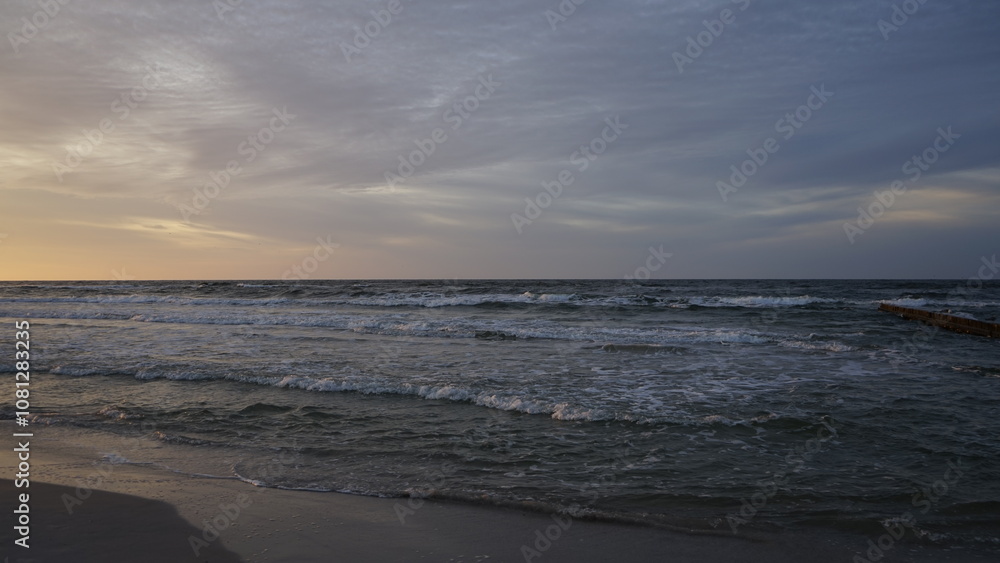 Sunset on the beach by the sea Sunset on the beach by the sea