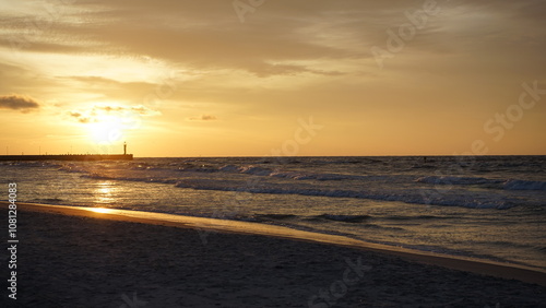 Sunset on the beach by the sea