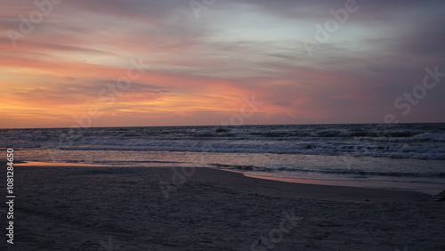 Sunset on the beach by the sea 