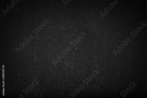 Black rusty metal texture. Grainy dark background