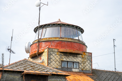 The distinctive rotating lookout tower atop Zvicina Hill offers panoramic views of the surrounding landscape, showcasing its unique architectural design and inviting exploration by visitors. photo