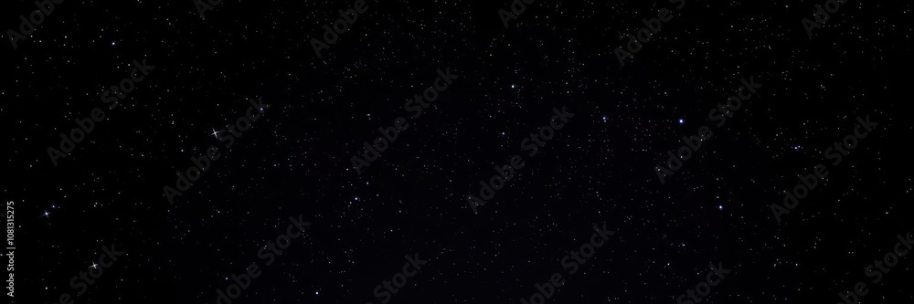 Fototapeta premium Dark night sky filled with twinkling stars and distant galaxies, black background, night scene