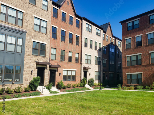 modern four-story brick townhouse