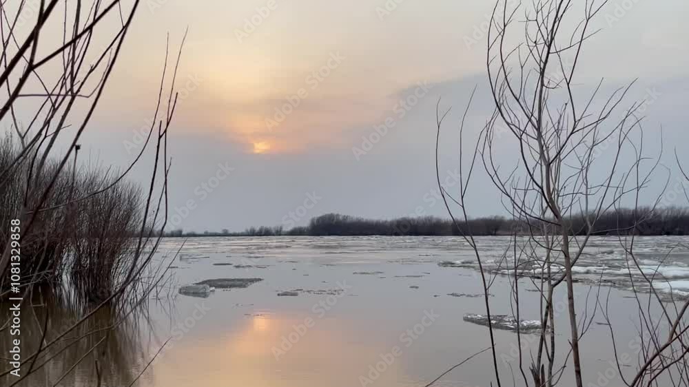 Ice drift on a river in spring during sunset Ice drift on a river in spring during sunset