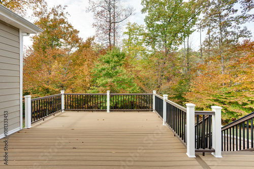 Spacious Wooden Deck Overlooking Autumn Forest View