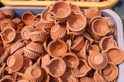 'Diya oil lamps' handmade from earthen clay used for decorating homes during Diwali festival celebrated by the religious Hindus across India. photo