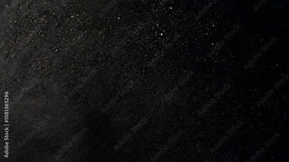 Textured Black Surface with Variations and Reflections, Creating Dramatic and Moody Atmosphere for Artistic Backgrounds and Projects. Textured Black Surface with Variations and Reflections, Creating Dramatic and Moody Atmosphere for Artistic Backgrounds and Projects.