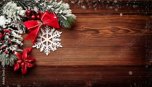 Christmas decoration on wooden background with snowflakes and copy space 