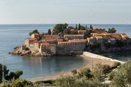 Panoramic view of island Sveti Stefan, Budva, Adriatic Mediterranean Sea, Montenegro. Summer vacation in exclusive luxury hotel complex resort at the seaside. High quality photo