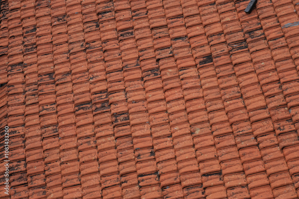 tile arrangement pattern on the roof of the house. tile pattern background. tile arrangement pattern on the roof of the house. tile pattern background.