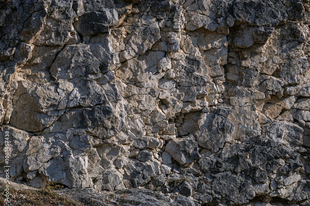 Close-up of mountain slope. Realistic background created by nature itself. Close-up of destruction, evolution of rock formation. Crimea. Close-up of mountain slope. Realistic background created by nature itself. Close-up of destruction, evolution of rock formation. Crimea.