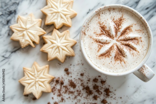 Cozy beverage with star-shaped cookies on marble.